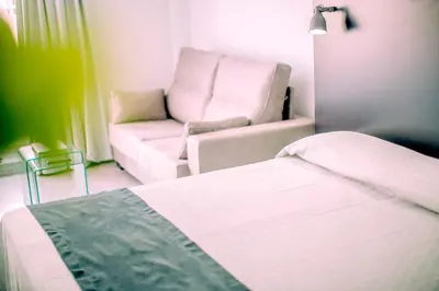 Cama o camas de una habitación en Mannix Urban Apartments