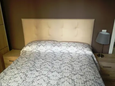Cama o camas de una habitación en HUELLA CANARIA Complejo LAS OLAS