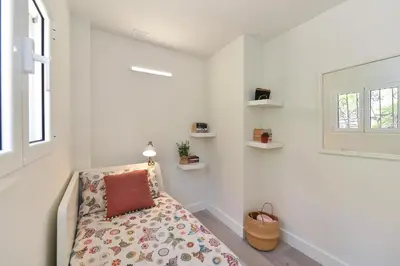 Cama o camas de una habitación en Bungalow San Agustin Rocas Rojas by VillaGranCanaria