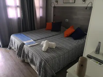 Cama o camas de una habitación en Maspalomas Bungalow C I