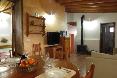Una televisión o centro de entretenimiento en Casa La Lomada