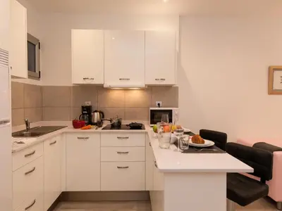 Una cocina o zona de cocina en Apartments Las Canteras Beach LM3 by VillaGranCanaria