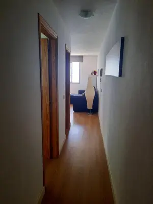 Una televisión o centro de entretenimiento en Seaside Apartment Gran Canaria