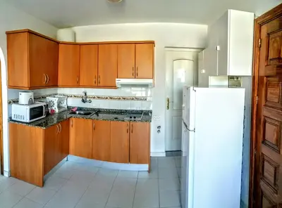 Una cocina o zona de cocina en Monseñor