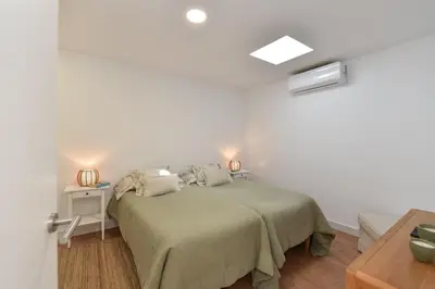 Cama o camas de una habitación en Apartamentos Don Carlos