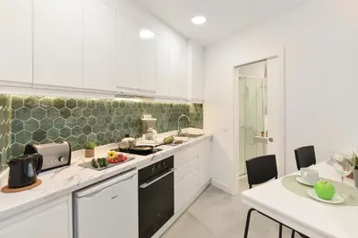 Una cocina o zona de cocina en Apartamentos Don Carlos