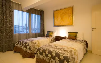 Cama o camas de una habitación en Terrace on the Beach