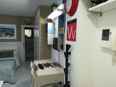 Una televisión o centro de entretenimiento en Apartamento Beach Loft Las Canteras