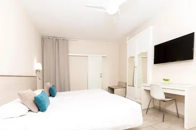 Cama o camas de una habitación en Hotel Madrid