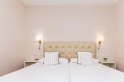 Cama o camas de una habitación en Hotel Madrid