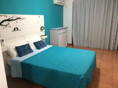 Cama o camas de una habitación en Hotel el Pino