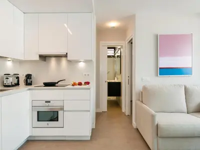 Una cocina o zona de cocina en Beachfront Apartment Siesta 21 San Agustin Playa by VillaGranCanaria