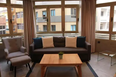 Zona de estar de Piso con piscina y garaje en la Playa de Las Canteras