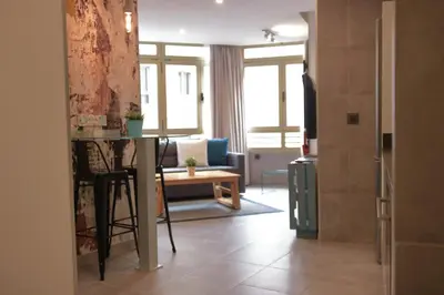 Zona de estar de Piso con piscina y garaje en la Playa de Las Canteras