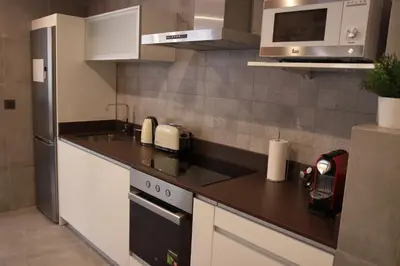 Una cocina o zona de cocina en Piso con piscina y garaje en la Playa de Las Canteras