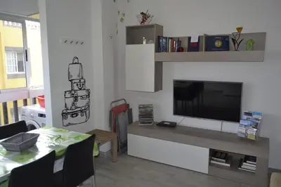 Una televisión o centro de entretenimiento en Vivienda Vacacional AP Las Canteras
