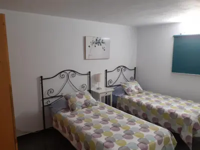 Cama o camas de una habitación en Casa Mina