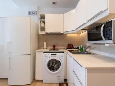 Una cocina o zona de cocina en Attico Albareda