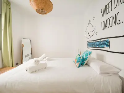 Cama o camas de una habitación en Las Canteras Beach Apartment Sagasta
