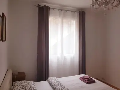 Cama o camas de una habitación en Lina Mogan