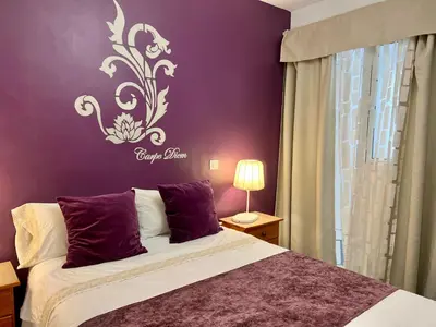 Cama o camas de una habitación en Apartamentos Dalia