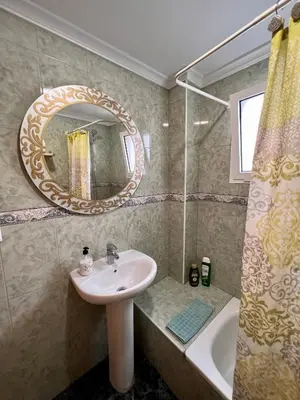 Un baño de Apartamentos Dalia