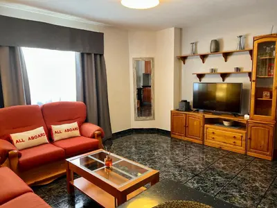 Una televisión o centro de entretenimiento en Apartamentos Dalia
