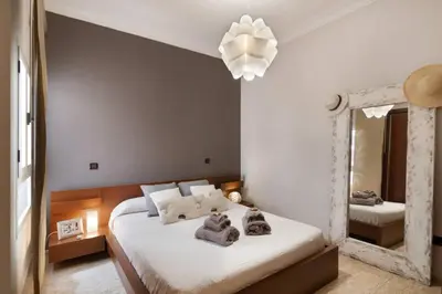 Cama o camas de una habitación en Canteras Beach Apartment