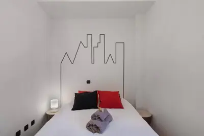 Cama o camas de una habitación en Canteras Beach Apartment