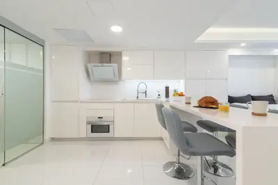 Una cocina o zona de cocina en Holiday Home Luxury Loft GC