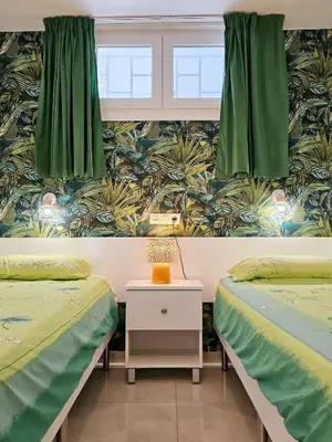 Cama o camas de una habitación en Apartamentos Bogota