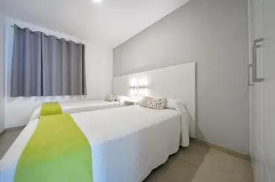 Cama o camas de una habitación en ConMar