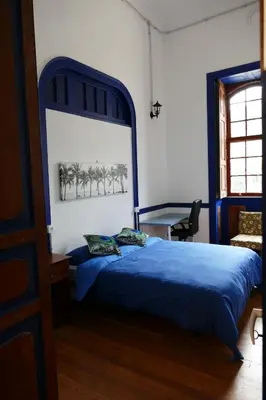 Cama o camas de una habitación en Atlantis Surf Hostel