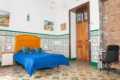 Cama o camas de una habitación en Atlantis Surf Hostel