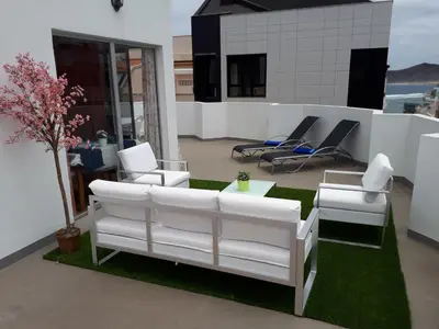 Zona de estar de City Beach Home 60
