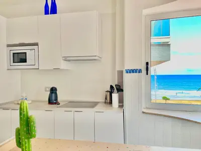 Una cocina o zona de cocina en LAS CANTERAS Sabor a Mar 2 Dormitorios 