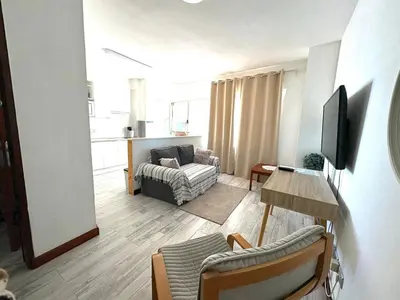 Una televisión o centro de entretenimiento en LAS CANTERAS Sabor a Mar 2 Dormitorios 