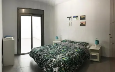 Cama o camas de una habitación en New cozy apartment next to the beach!