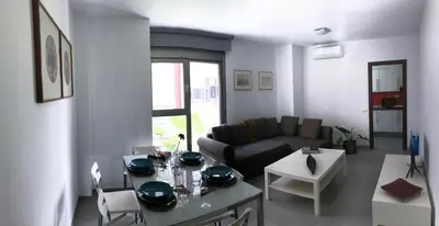 Zona de estar de New cozy apartment next to the beach!