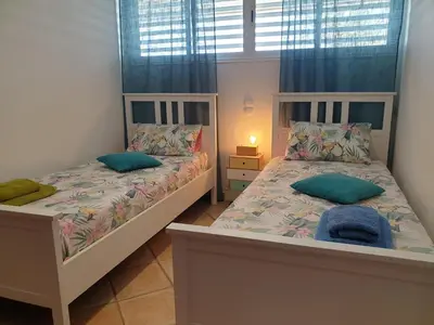 Cama o camas de una habitación en Bungalow Paraiso El Mar 3