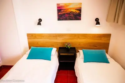 Cama o camas de una habitación en Seaview Canteras