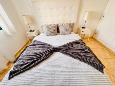 Cama o camas de una habitación en AMADORES BEACH & OCEAN VIEWS