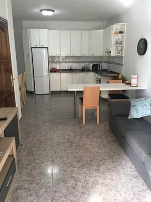 Una cocina o zona de cocina en Apart Juan de Cardona