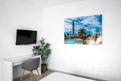 Una televisión o centro de entretenimiento en Hotel Valencia