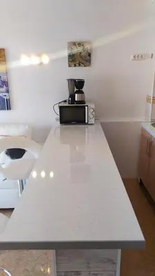 Una cocina o zona de cocina en Aircon Pool View Nr Yumbo