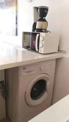 Una cocina o zona de cocina en Aircon Pool View Nr Yumbo