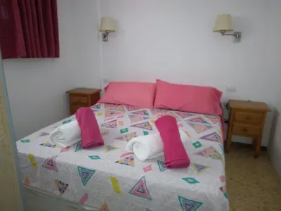 Cama o camas de una habitación en Holiday Apartment