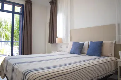Cama o camas de una habitación en TC Bahía Meloneras