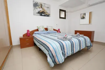 Cama o camas de una habitación en Masvacation Duna Exerlsior 3Room,Pool