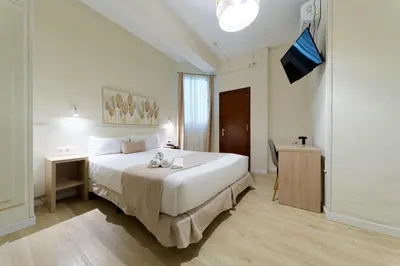 Cama o camas de una habitación en Ura Hotels Boutique Gurea
